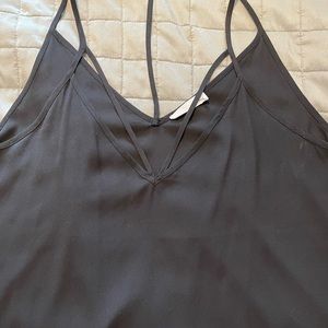 Black tank! Only worn a few times. Great for going out!